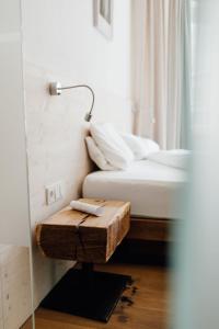 Letto o letti in una camera di Hotel Hinteregger