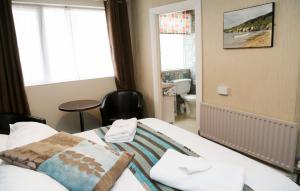 Postel nebo postele na pokoji v ubytování Avarest House BB Adults Only