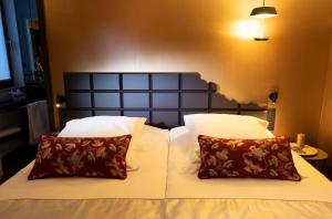B-Lodge Boutique Hôtel客房内的一张或多张床位