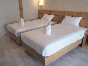Postel nebo postele na pokoji v ubytování Luxe Villa