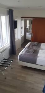 Letto o letti in una camera di Apotek Guesthouse