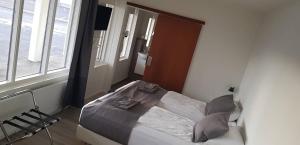 Letto o letti in una camera di Apotek Guesthouse