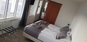 Letto o letti in una camera di Apotek Guesthouse