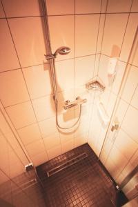 Bathroom sa Hotel Am Vogelsanger Weg