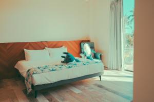 Giường trong phòng chung tại Shark B&B