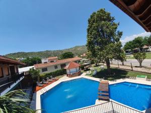 Bazén v ubytování Hotel Carlos Paz nebo v jeho okolí