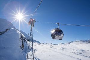 Kaprun Apartments v zime