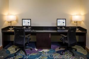 an office with two desks with two monitors and two chairs at Holiday Inn Express - Clermont, an IHG Hotel in Clermont