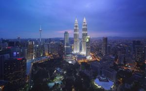 an aerial view of a city at night at Grand Hyatt Kuala Lumpur in Kuala Lumpur