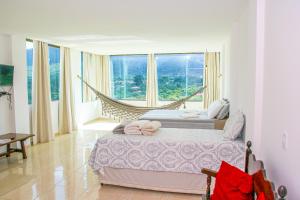 Cama ou camas em um quarto em Pousada Vie