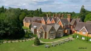 an aerial view of a large mansion at Audleys Wood Hotel, Basingstoke in Basingstoke