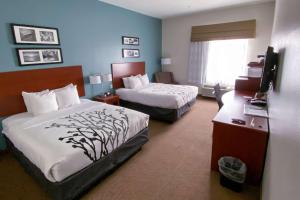 Katil atau katil-katil dalam bilik di Sleep Inn & Suites Pearland - Houston South