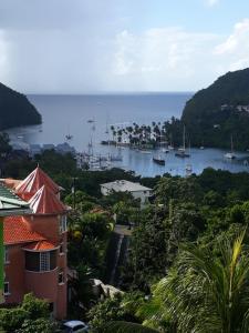a view of a harbor with boats in the water at Amazon Villas in Soufrière