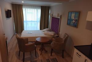Posezení v ubytování Cadde Suite Bakırköy