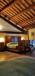 Posteľ alebo postele v izbe v ubytovaní Agriturismo-R&B Corte dei Gioghi + 37 fotografií