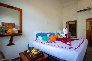 מיטה או מיטות בחדר ב-The Surf Access Guest House