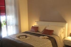 Postel nebo postele na pokoji v ubytování ValpoHome&Rooms