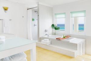 Voodi või voodid majutusasutuse Couples Tower Isle toas