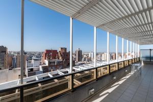 a view from the top of a building with windows at AT Suites in Córdoba