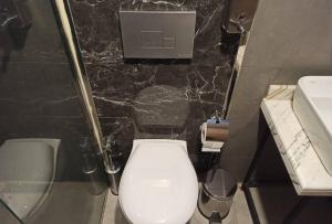 Koupelna v ubytování Cadde Suite Bakırköy
