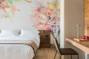 Postel nebo postele na pokoji v ubytování QC Room San Pellegrino