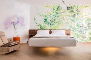 Postel nebo postele na pokoji v ubytování QC Room San Pellegrino