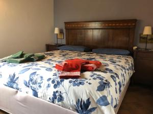 Postel nebo postele na pokoji v ubytování Agriturismo Terre Bianche