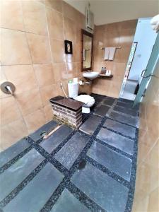 Koupelna v ubytování Astana Swaha Villa