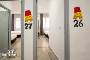 Postel nebo postele na pokoji v ubytování Hôtel Royal Urban Concept