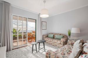 Χώρος καθιστικού στο Garajau I by An Island Apart