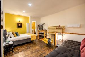 A bed or beds in a room at Casa Hosteno