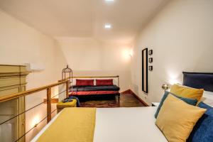 A bed or beds in a room at Casa Hosteno