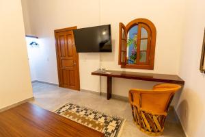 Sjónvarps- og/eða afþreyingartæki á Plaza Chapala Hotel