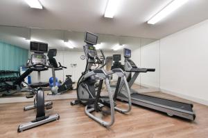 a gym with treadmills and elliptical machines at Holiday Inn Express Mystic, an IHG Hotel in Mystic