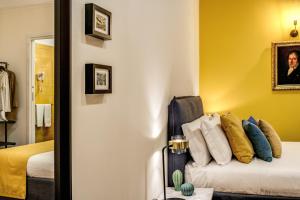 A bed or beds in a room at Casa Hosteno