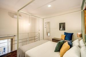 A bed or beds in a room at Casa Hosteno