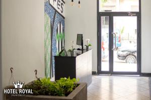 TV a/nebo společenská místnost v ubytování Hôtel Royal Urban Concept