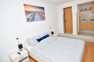 Posteľ alebo postele v izbe v ubytovaní Studio apartment Fazana