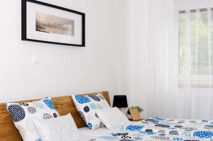 Postel nebo postele na pokoji v ubytování Apartmány u Kotačků