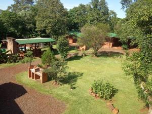 an aerial view of a garden with a building at Estrella del Monte in Puerto Iguazú