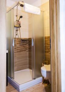 Koupelna v ubytování Apartmány u Kotačků