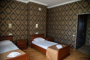 Posteľ alebo postele v izbe v ubytovaní Complex Zolota Pidkova