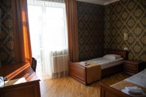 Posteľ alebo postele v izbe v ubytovaní Complex Zolota Pidkova