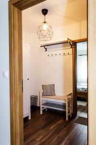 Postel nebo postele na pokoji v ubytování Apartmány u Kotačků