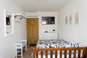 Postel nebo postele na pokoji v ubytování Apartmány u Kotačků
