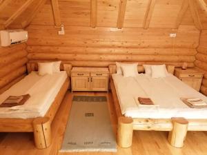 Postel nebo postele na pokoji v ubytování Apartmani Žuti Leptir