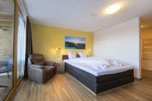 Postel nebo postele na pokoji v ubytování Hotel Krimml