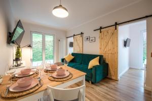 Posedenie v ubytovaní Apartament Tarasowy z PRYWATNĄ SAUNĄ - 5D Apartamenty