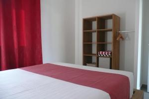 Postel nebo postele na pokoji v ubytování Douceurs Caraïbes, Gîte Cannelle