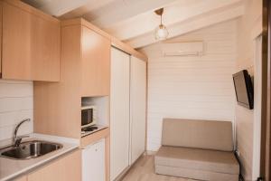 Kuchyň nebo kuchyňský kout v ubytování Hotel Neptuno